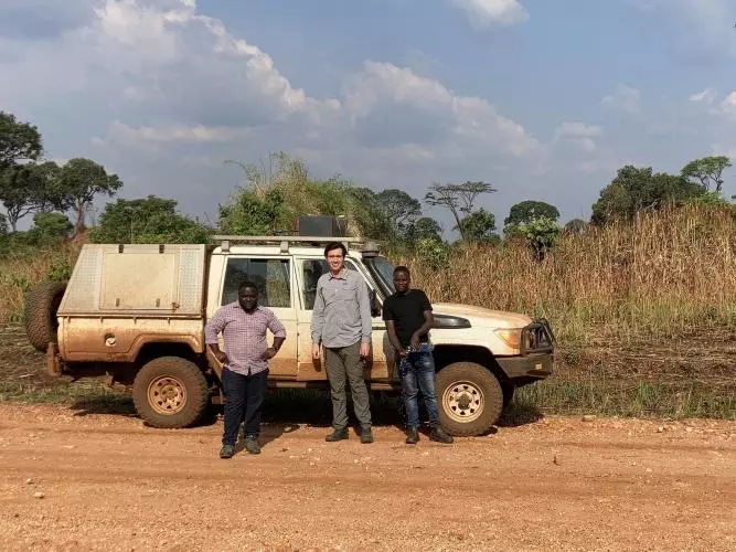 Dr Tobermory Mackay-Champion, standing with Mr Sekelo Mutelekesha (co-author), and a driver from First Quantum Minerals Ltd.